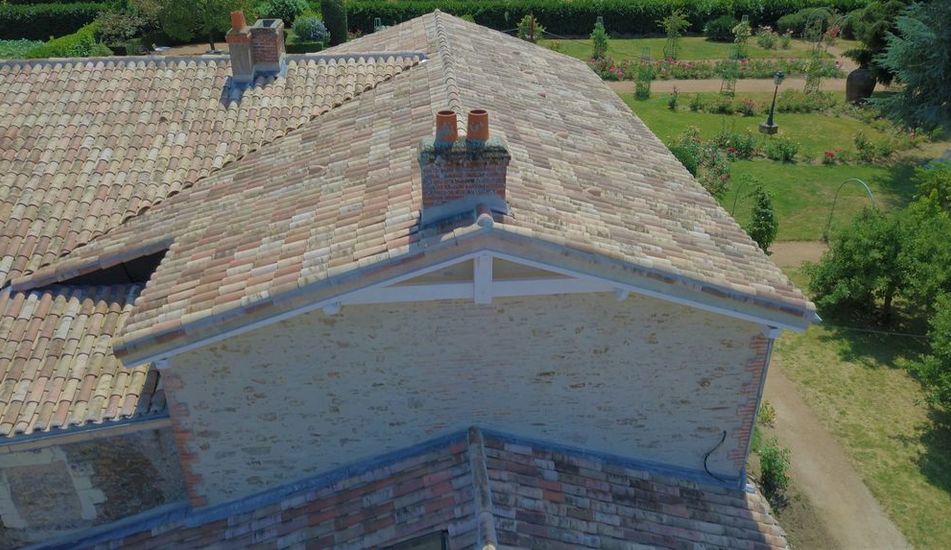 Restauration de la toiture tuile et isolation de la toiture par l'extérieur